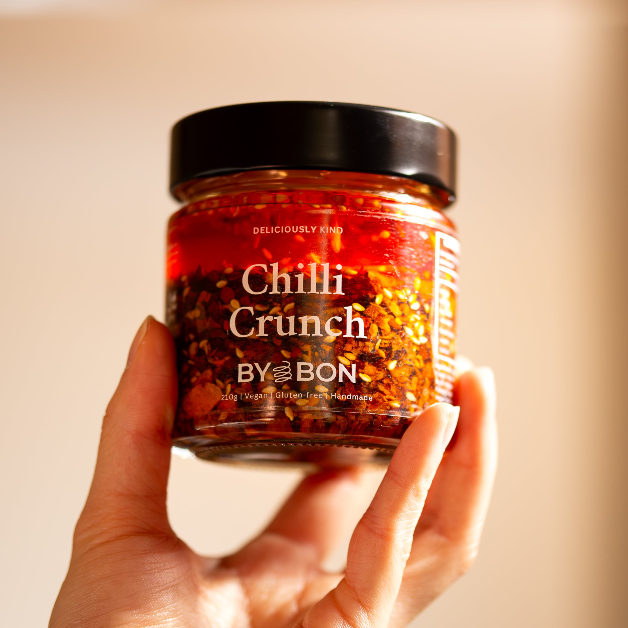 Chilli Crunch held in hand Chilli Oil Vegan